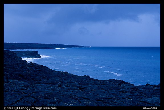 Coast covered with hardened lava and approaching storm. Hawaii Volcanoes National Park, Hawaii, USA.