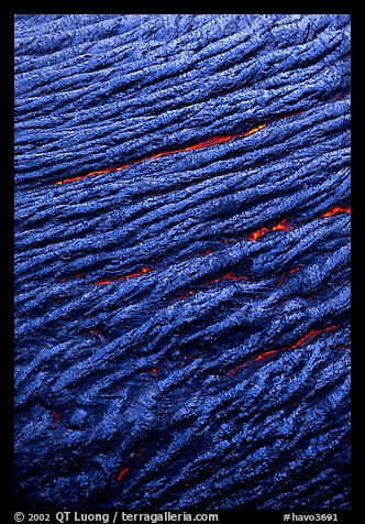 Ripples of flowing pahoehoe lava detail. Hawaii Volcanoes National Park, Hawaii, USA.