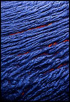 Ripples of flowing pahoehoe lava detail. Hawaii Volcanoes National Park, Hawaii, USA.