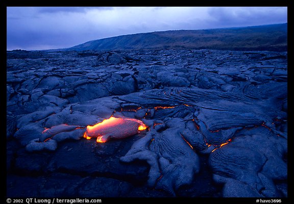 Live lava flow at dusk near the end of Chain of Craters road. Hawaii Volcanoes National Park