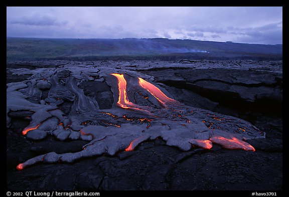 Molten lava flow at dawn on coastal plain. Hawaii Volcanoes National Park, Hawaii, USA.