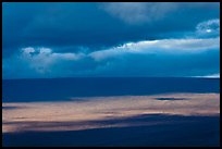 Light, shadows and clouds over Mauna Loa summit. Hawaii Volcanoes National Park, Hawaii, USA. (color)