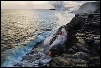 Coastline with lava entering ocean. Hawaii Volcanoes National Park, Hawaii, USA. (color)