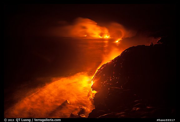 Streams of lava flow into Pacific Ocean. Hawaii Volcanoes National Park, Hawaii, USA.