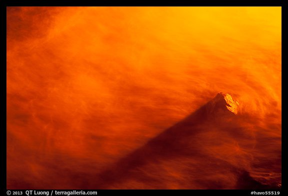 Rock and ocean water illuminated by lava. Hawaii Volcanoes National Park (color)