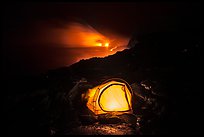 Tent and lava ocean entry. Hawaii Volcanoes National Park, Hawaii, USA.