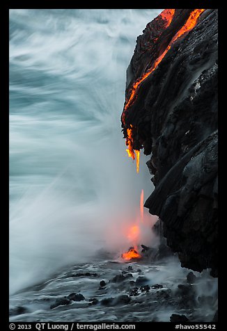 Molten lava drips into the sea. Hawaii Volcanoes National Park, Hawaii, USA.