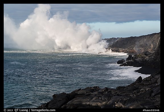Clouds of smoke and steam produced by lava flowing into ocean. Hawaii Volcanoes National Park (color)