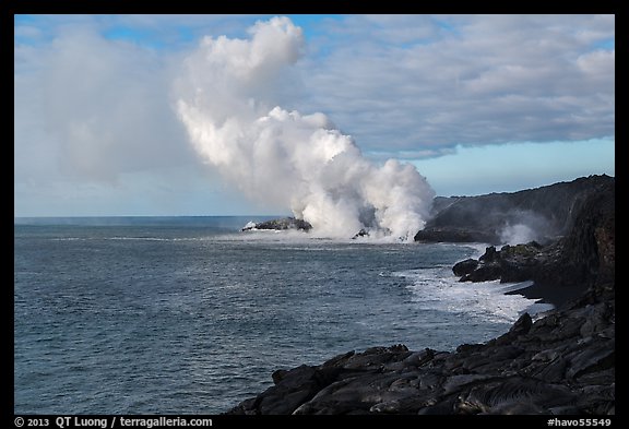 Billowing coastal smoke plume carries toxic sulphur dioxide as lava enters Pacific Ocean. Hawaii Volcanoes National Park, Hawaii, USA.