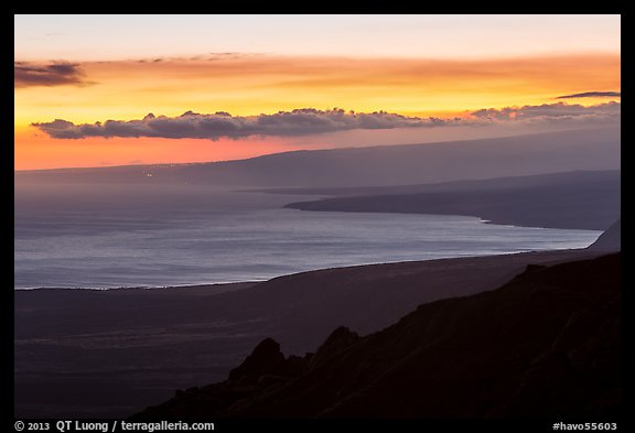 Coastal plain, bay, and Mauna Loa flank at sunset. Hawaii Volcanoes National Park, Hawaii, USA.