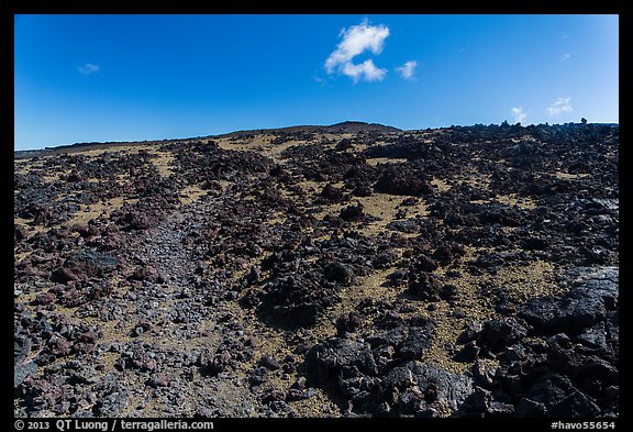 Blocks of aa lava and olivine sand, North Pit, Mauna Loa. Hawaii Volcanoes National Park, Hawaii, USA.