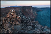 Summit cairn and crater at dusk. Hawaii Volcanoes National Park, Hawaii, USA. (color)