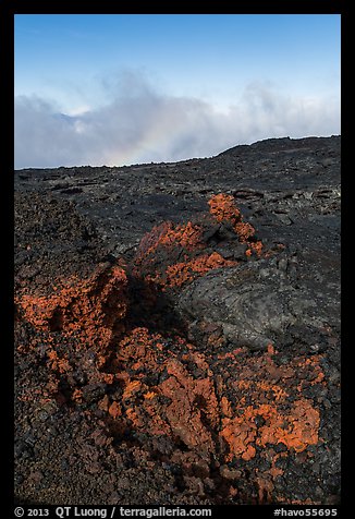 Red and orange lava, rainbow in clouds, Mauna Loa. Hawaii Volcanoes National Park (color)