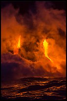 Lava cascading cliffs above ocean waves at night. Hawaii Volcanoes National Park ( color)