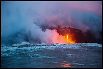 Lava flows creating huge clouds of hydrochloric steam upon meeting with ocean. Hawaii Volcanoes National Park, Hawaii, USA. (color)