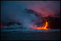 Lava flow seen from the ocean at dawn. Hawaii Volcanoes National Park, Hawaii, USA.