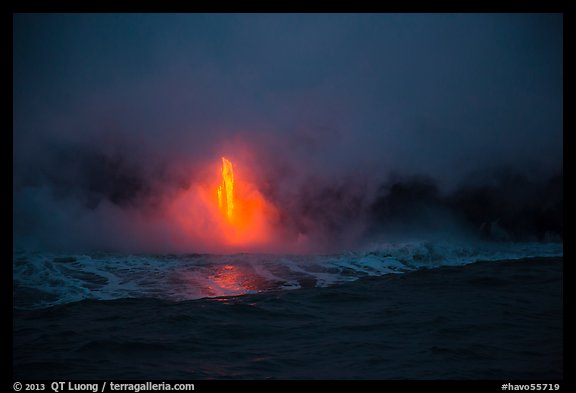 Lava flow at dawn, ocean reflection, and steam plume. Hawaii Volcanoes National Park (color)