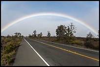 Rainbow over highway. Hawaii Volcanoes National Park, Hawaii, USA.