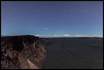 Mauna Loa summit cliffs, Mokuaweoweo crater moonlit at night. Hawaii Volcanoes National Park, Hawaii, USA. (color)