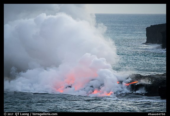 Lava reaching ocean from bench. Hawaii Volcanoes National Park (color)