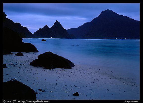 Beach and pointed peaks at dusk, Ofu Island. National Park of American Samoa