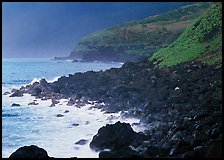 Coastline with Balsalt boulders on the wild South coast of Tau Island. National Park of American Samoa (color)