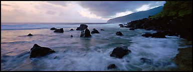 Dynamic seascape with boulders and surf, Tau Island. National Park of American Samoa