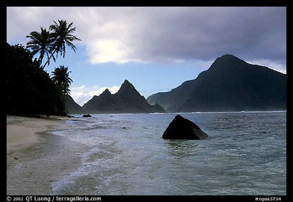 Sunuitao Peak and Piumafua mountain on Olosega Island from the South Beach, Ofu Island. National Park of American Samoa