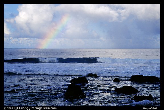 Rainbow and boulders, Siu Point, Tau Island. National Park of American Samoa (color)