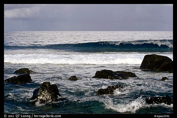 Boulders and surf, Tau Island. National Park of American Samoa (color)