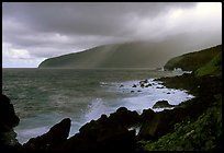 Seascape with dark rocks and sky, Siu Point, Tau Island. National Park of American Samoa