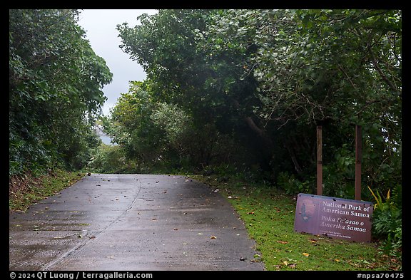 Park sign and road, Ofu Island. National Park of American Samoa (color)