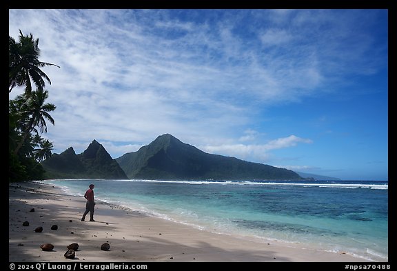 Visitor looking, Ofu South Beach. National Park of American Samoa (color)