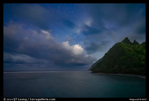 Tropical clouds and stars over Asaga Strait and Sunuitao Peak, Ofu Island. National Park of American Samoa (color)
