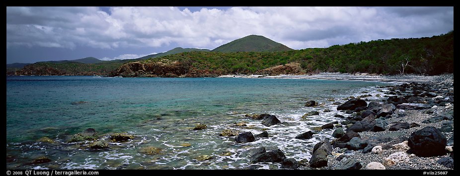 Bay lined with boulders and verdant hills. Virgin Islands National Park (color)