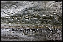 Taino petroglyph carvings reflected in pond. Virgin Islands National Park ( color)