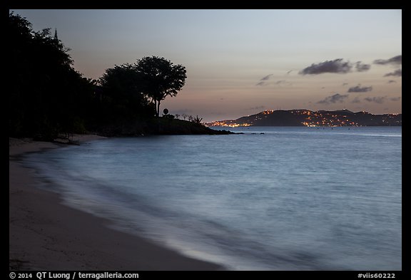Honeymoon beach at dusk with lights of St Thomas. Virgin Islands National Park (color)