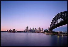 Harbor Bridge, skyline, and Opera House, dawn. Sydney, New South Wales, Australia (color)