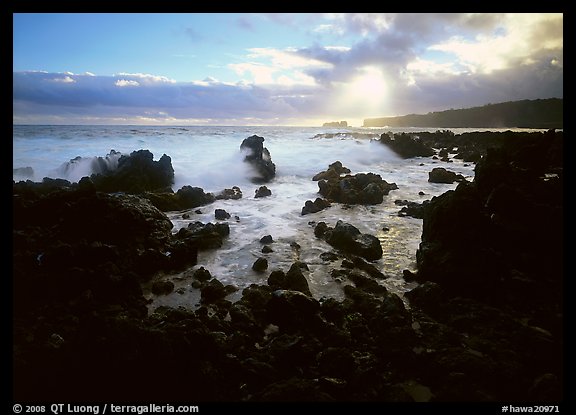 Rocks and surf at sunrise, Keanae Peninsula. Maui, Hawaii, USA