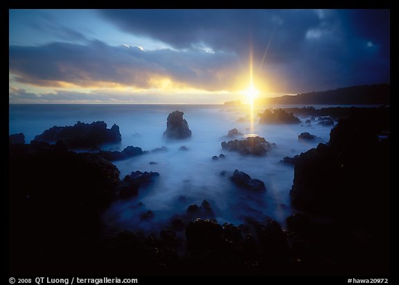 Sun shining brilliantly over primeval seascape, Kenae Peninsula. Maui, Hawaii, USA