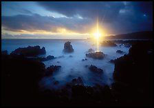 Sun shining brilliantly over primeval seascape, Kenae Peninsula. Hawaii, USA ( color)