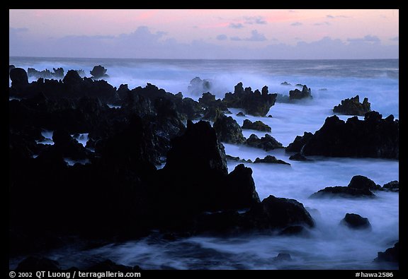 Rocks and surf, dawn, Keanae Peninsula. Maui, Hawaii, USA (color)