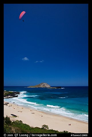 Makapuu Beach with paraglider above. Oahu island, Hawaii, USA