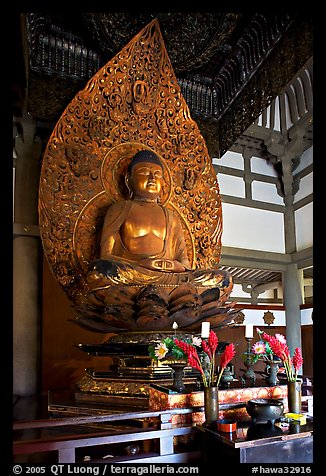 Amida seated on a lotus flower, the largest Buddha statue carved in over 900 years, Byodo-In Temple. Oahu island, Hawaii, USA