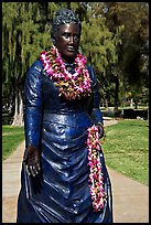 Statue of queen with fresh flower leis. Waikiki, Honolulu, Oahu island, Hawaii, USA