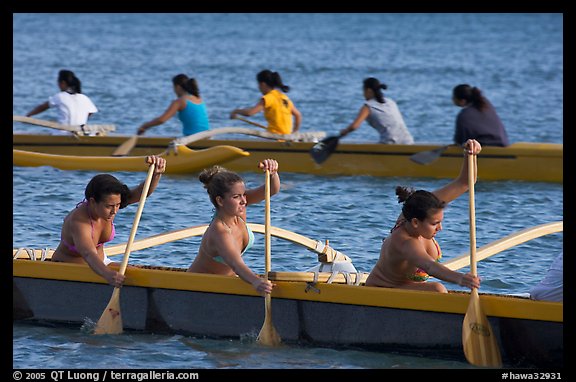 Outriggers canoes during late afternoon practice, Maunalua Bay. Oahu island, Hawaii, USA