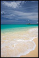 Foam, sand, and turquoise waters, Waimanalo Beach. Oahu island, Hawaii, USA (color)