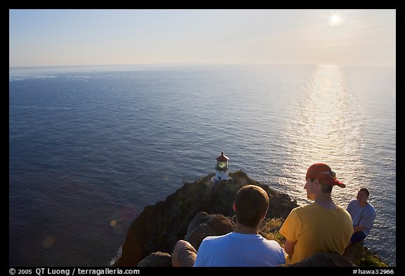 Men above the Makapuu head ligthouse, early morning. Oahu island, Hawaii, USA (color)