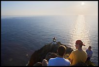 Men above the Makapuu head ligthouse, early morning. Oahu island, Hawaii, USA ( color)