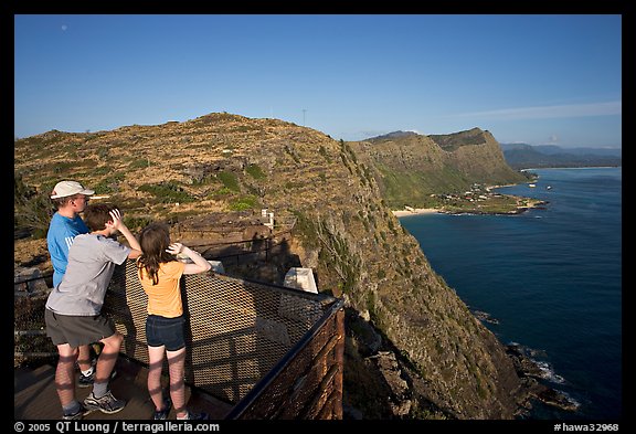 Family on the lookout on the summit of Makapuu head, early morning. Oahu island, Hawaii, USA (color)